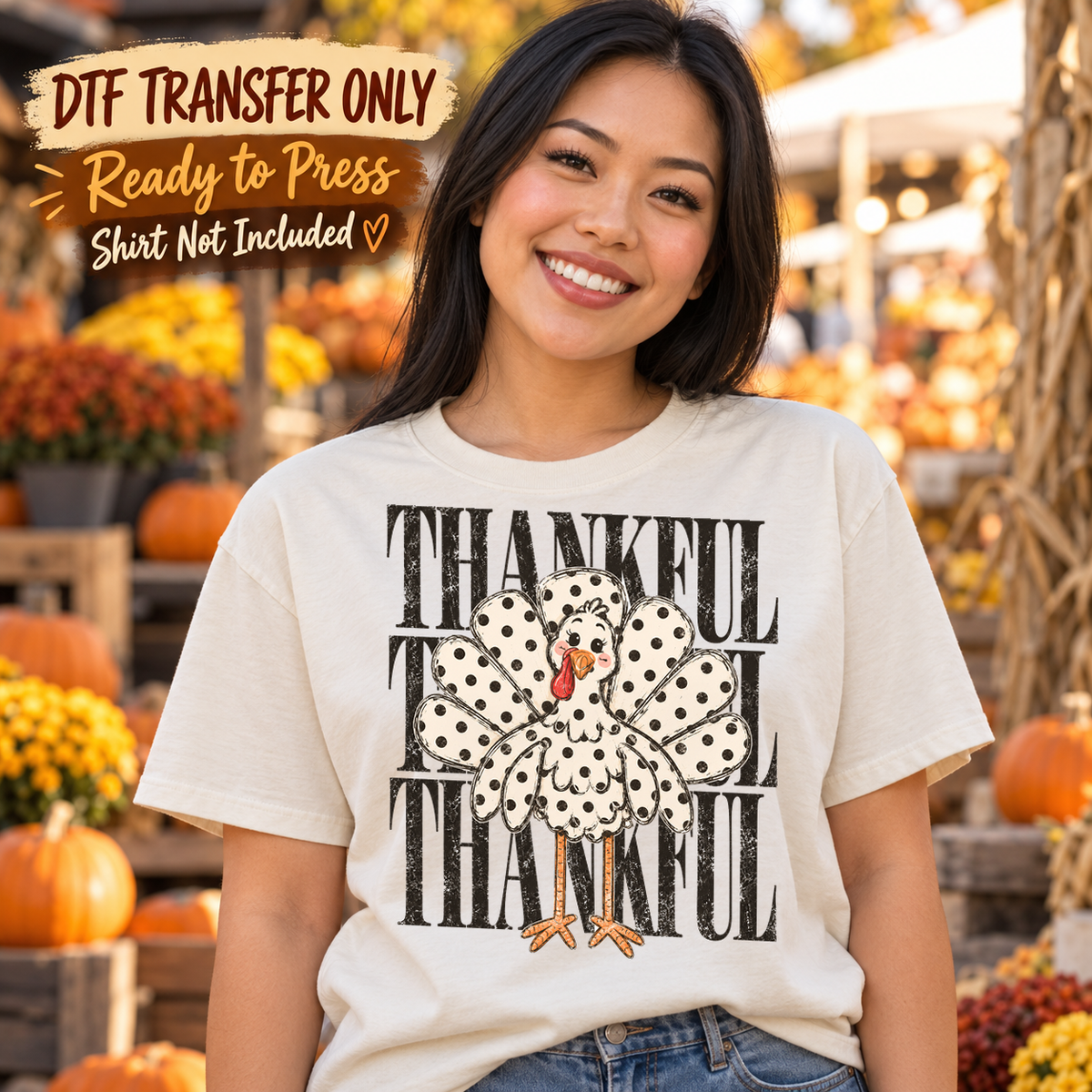 Woman in a white tee with a polka-dot turkey in front of repeated black Thankful lettering, labeled DTF transfer only.