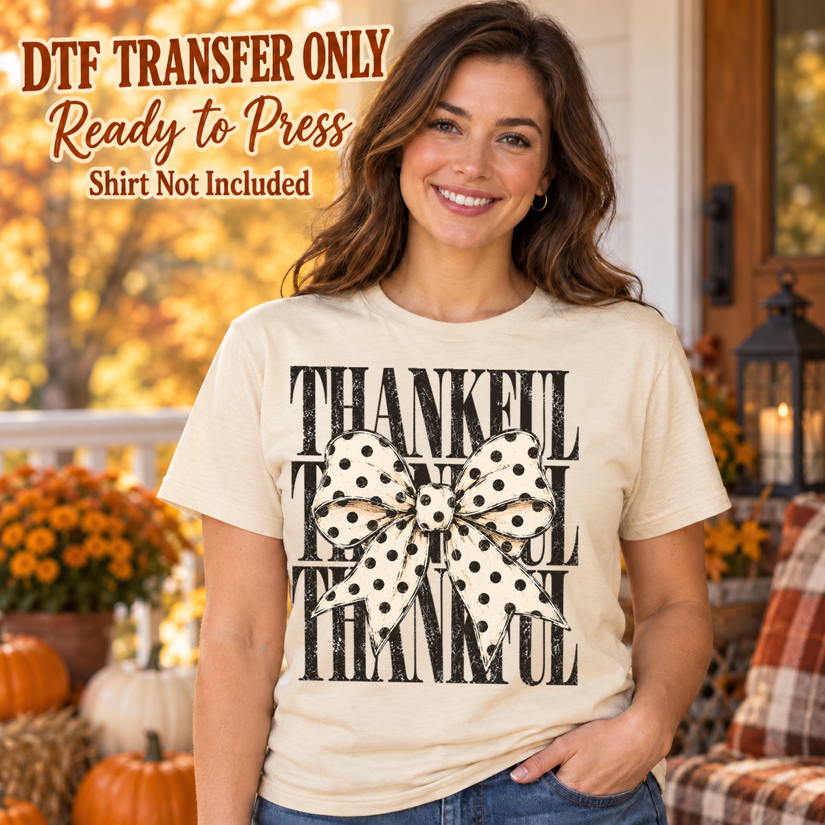 Woman in a cream tee showing repeated black Thankful lettering behind a large cream and black polka-dot bow, labeled transfer only.