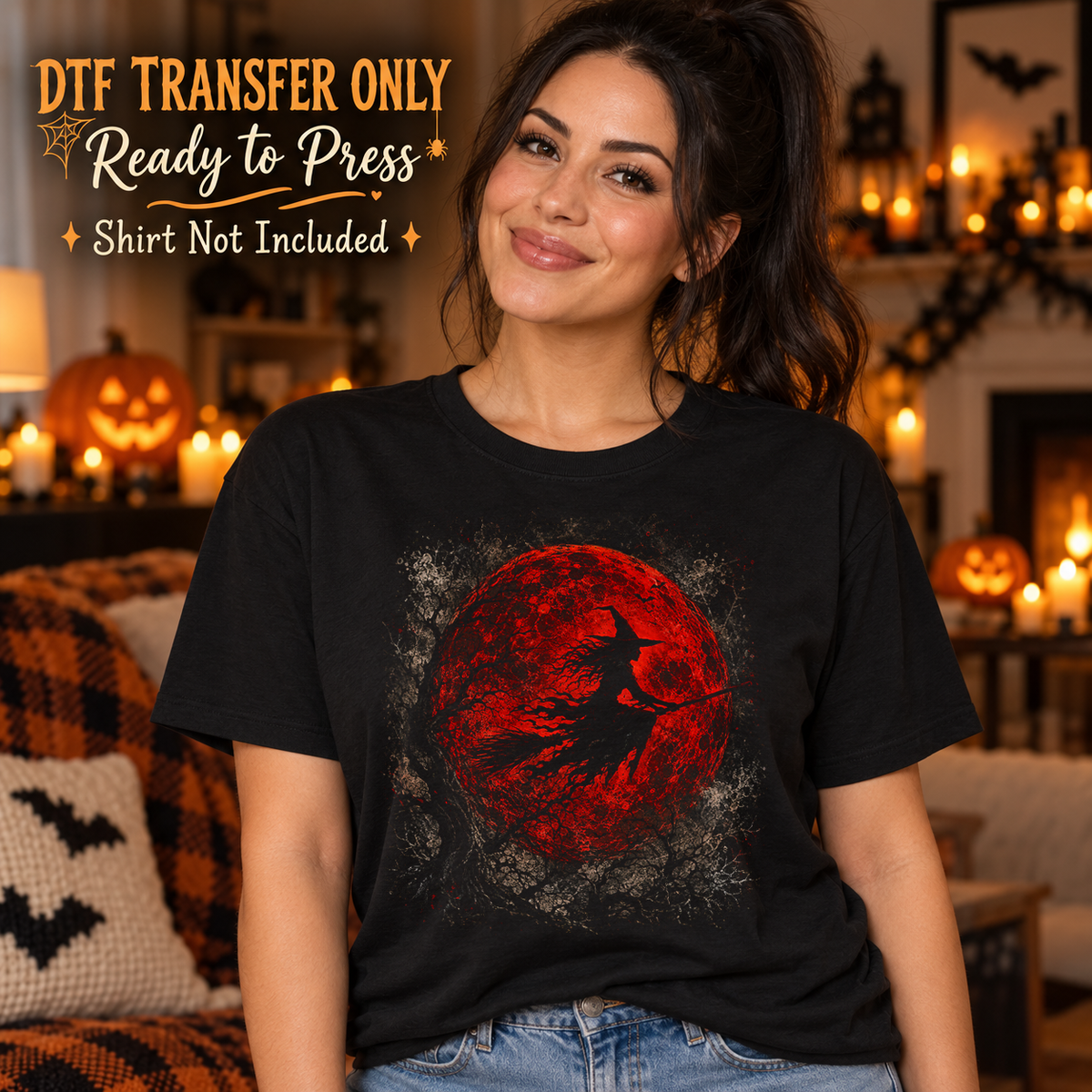 Woman in a black tee displaying a flying witch on a broom against a distressed red moon, labeled DTF transfer only.