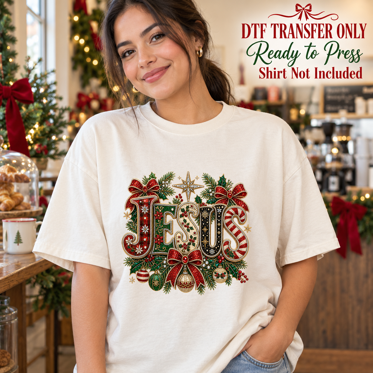 Woman in a white tee displaying decorative Jesus lettering with Christmas bows, greenery and a star, labeled transfer only.