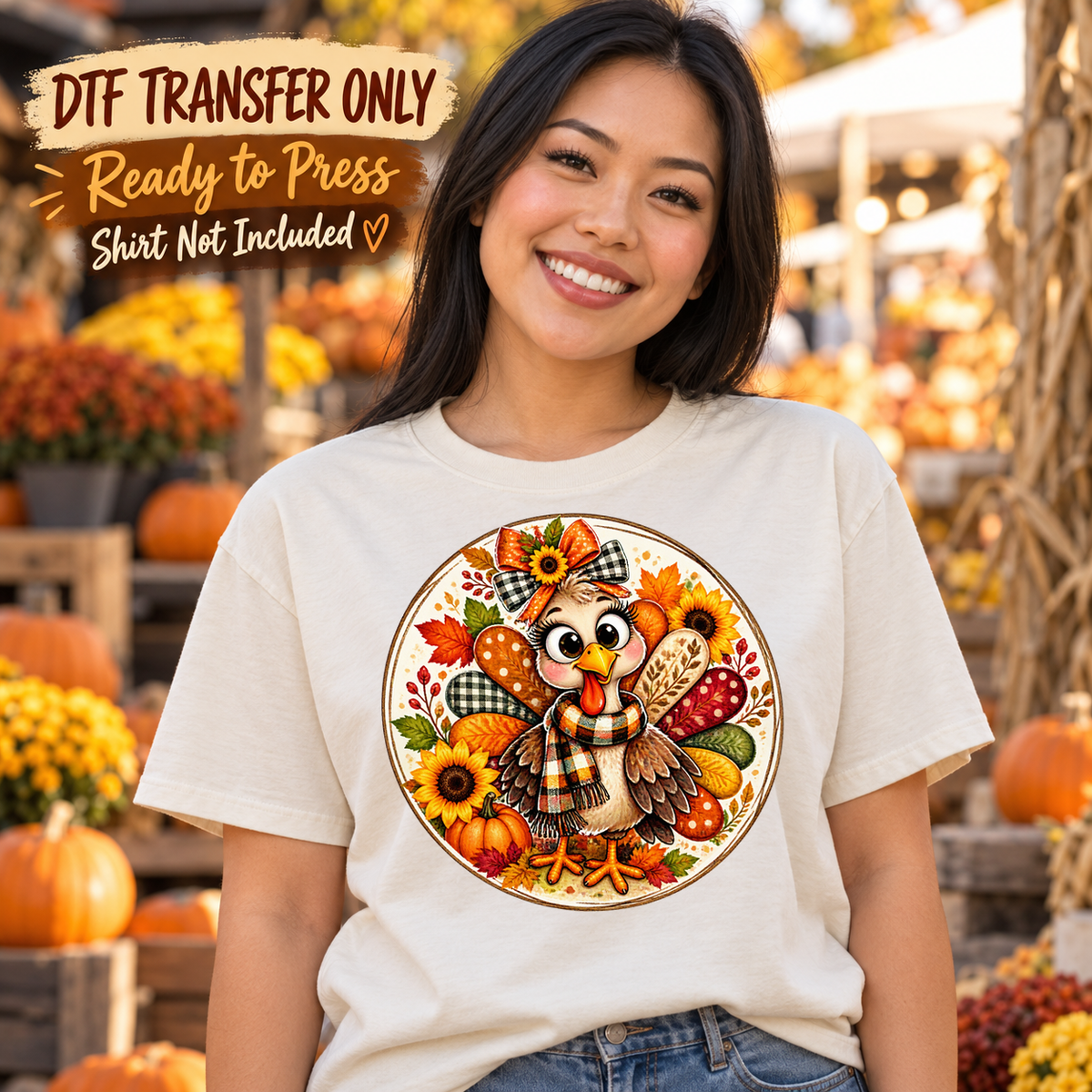 Woman in a white tee showing a round harvest design with a cute turkey, sunflowers and pumpkins, labeled DTF transfer only.
