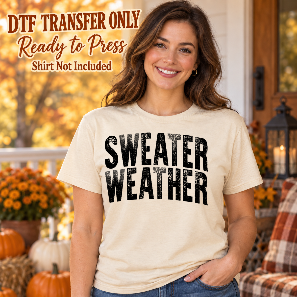 Woman in an ivory tee with large distressed black Sweater Weather lettering in two lines, labeled DTF transfer only.