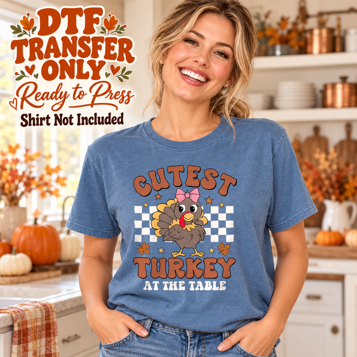 Woman in a blue tee with a pink-bow turkey, white checkerboard and Cutest Turkey at the Table text, labeled transfer only.