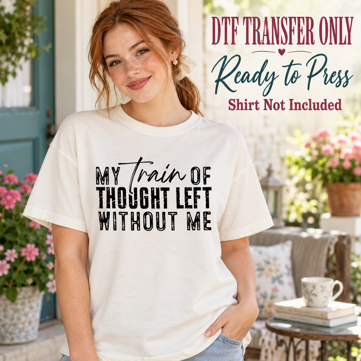 Woman in a white tee with black My Train of Thought Left Without Me text in mixed script and distressed lettering, labeled transfer only.