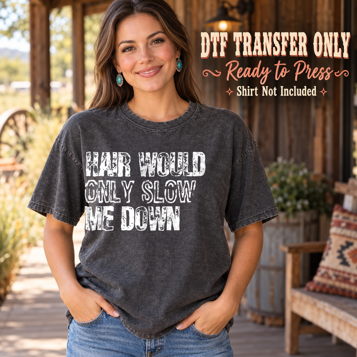 Woman in a charcoal washed tee displaying white Hair Would Only Slow Me Down distressed block lettering, labeled DTF transfer only.