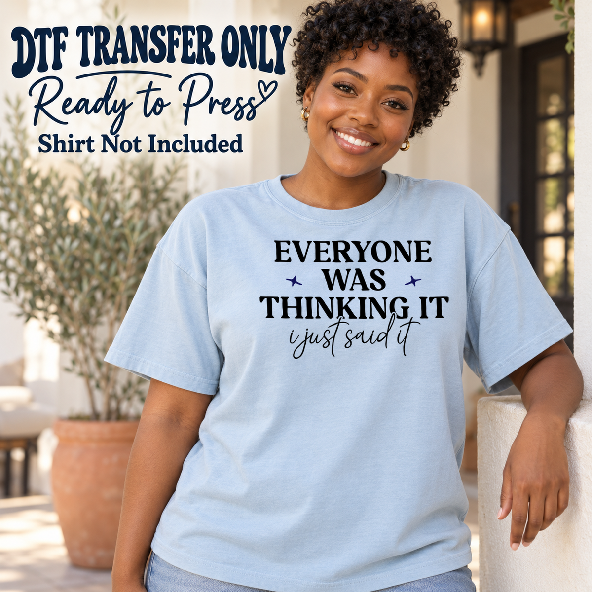 Woman in a light blue tee with black Everyone Was Thinking It I Just Said It text and small star accents, labeled transfer only.