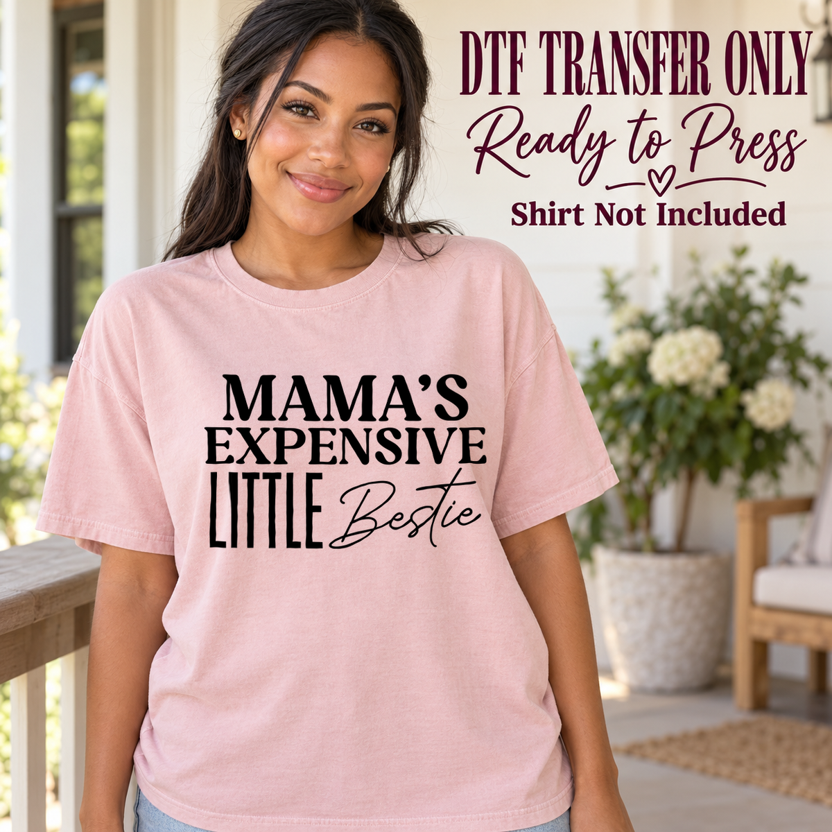 Woman in a pink tee displaying black Mama's Expensive Little Bestie lettering with Bestie in script, labeled transfer only.