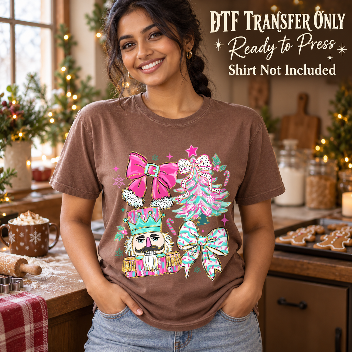 Woman in a brown tee with a pink and mint collage of bows, a Christmas tree and a nutcracker, labeled DTF transfer only.