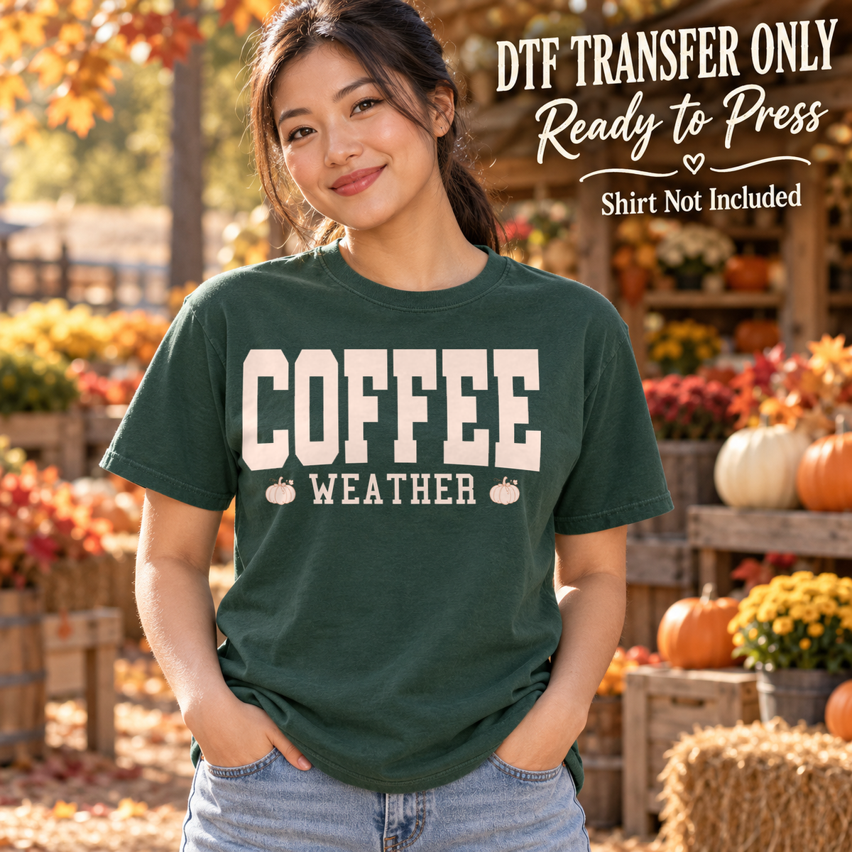 Woman in a dark green tee with cream retro Coffee Weather lettering and small pumpkin accents, labeled DTF transfer only.