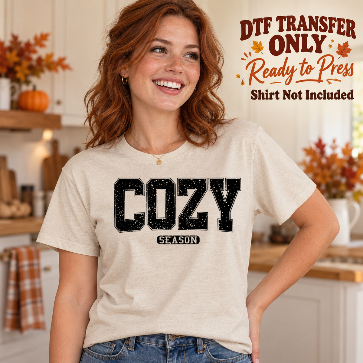 Woman in an ivory tee with large black varsity-style Cozy lettering above a small Season label, marked DTF transfer only.