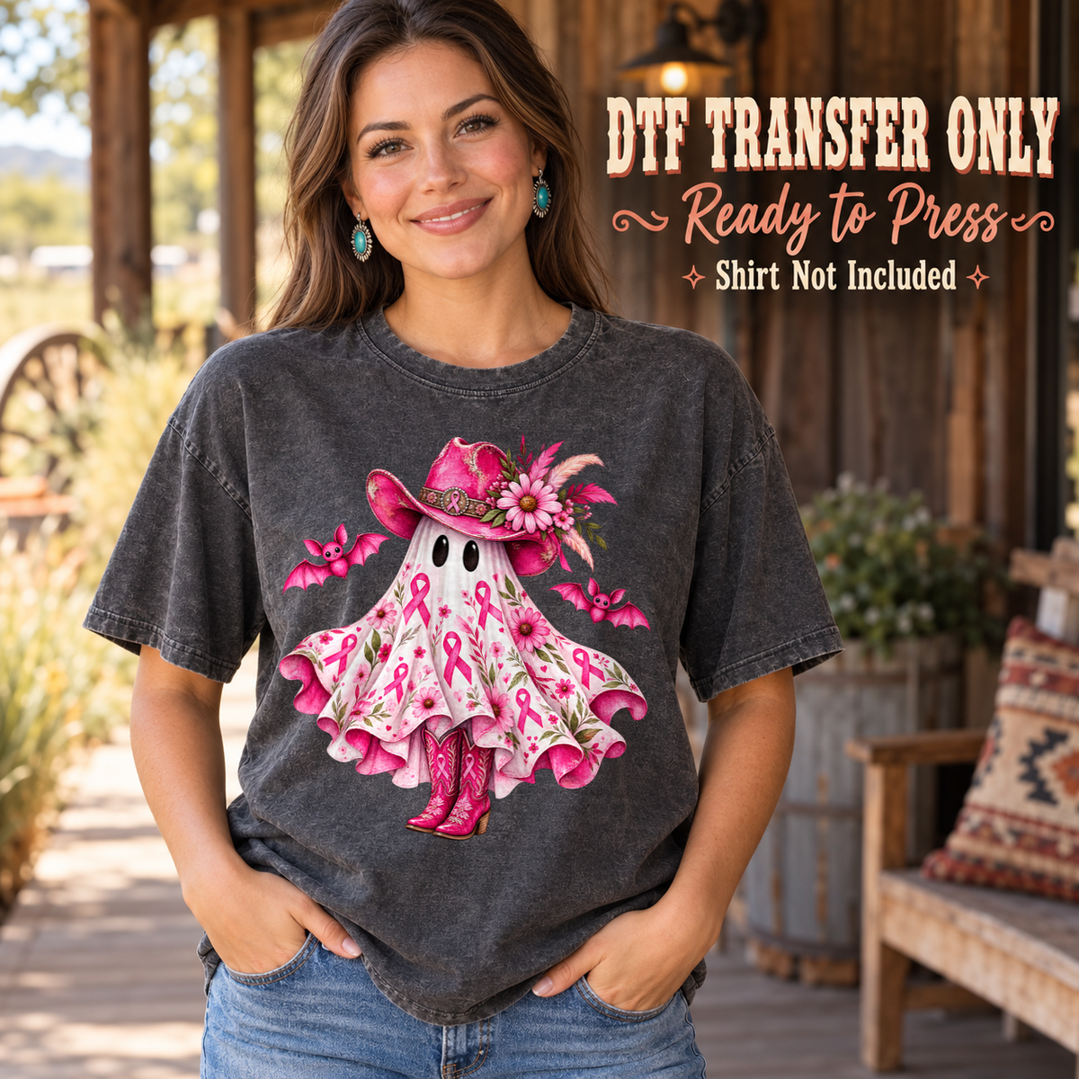 Pink floral ghost wearing a witch hat and pink boots, shown on a charcoal shirt model mockup; physical DTF transfer only, shirt not included.
