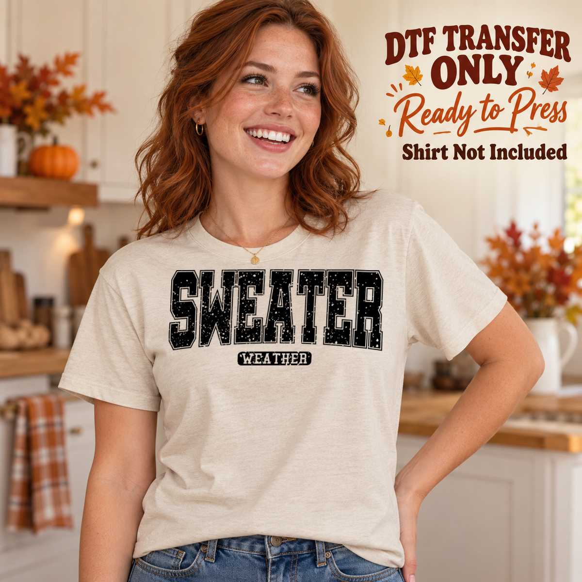Black distressed SWEATER lettering over smaller WEATHER text, shown on a cream shirt model mockup; physical DTF transfer only, shirt not included.