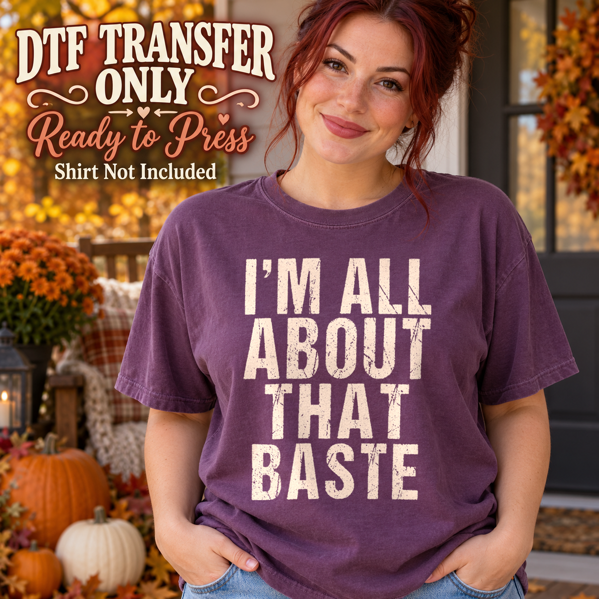 Cream I'M ALL ABOUT THAT BASTE stacked lettering, shown on a plum shirt model mockup; physical DTF transfer only, shirt not included.