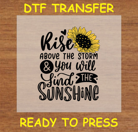 DTF Transfer with 'Rise Above the Storm & You Will Find the Sunshine' and sunflower design for custom apparel.
