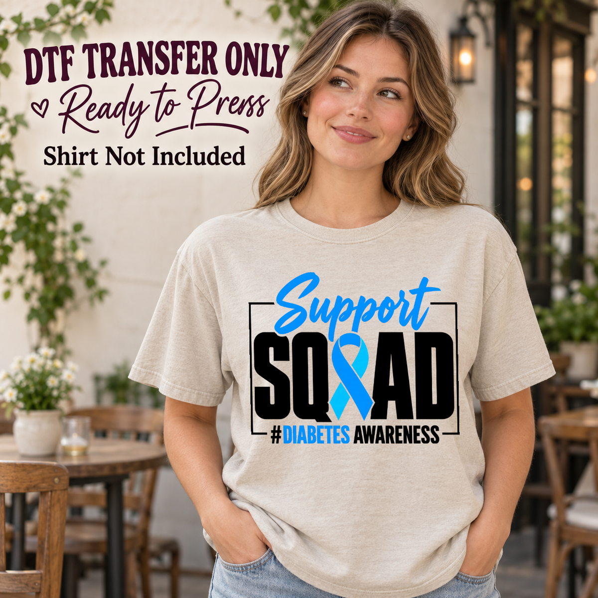 Model wearing a cream shirt showing Support Squad black lettering with a blue ribbon; DTF transfer only, shirt not included.