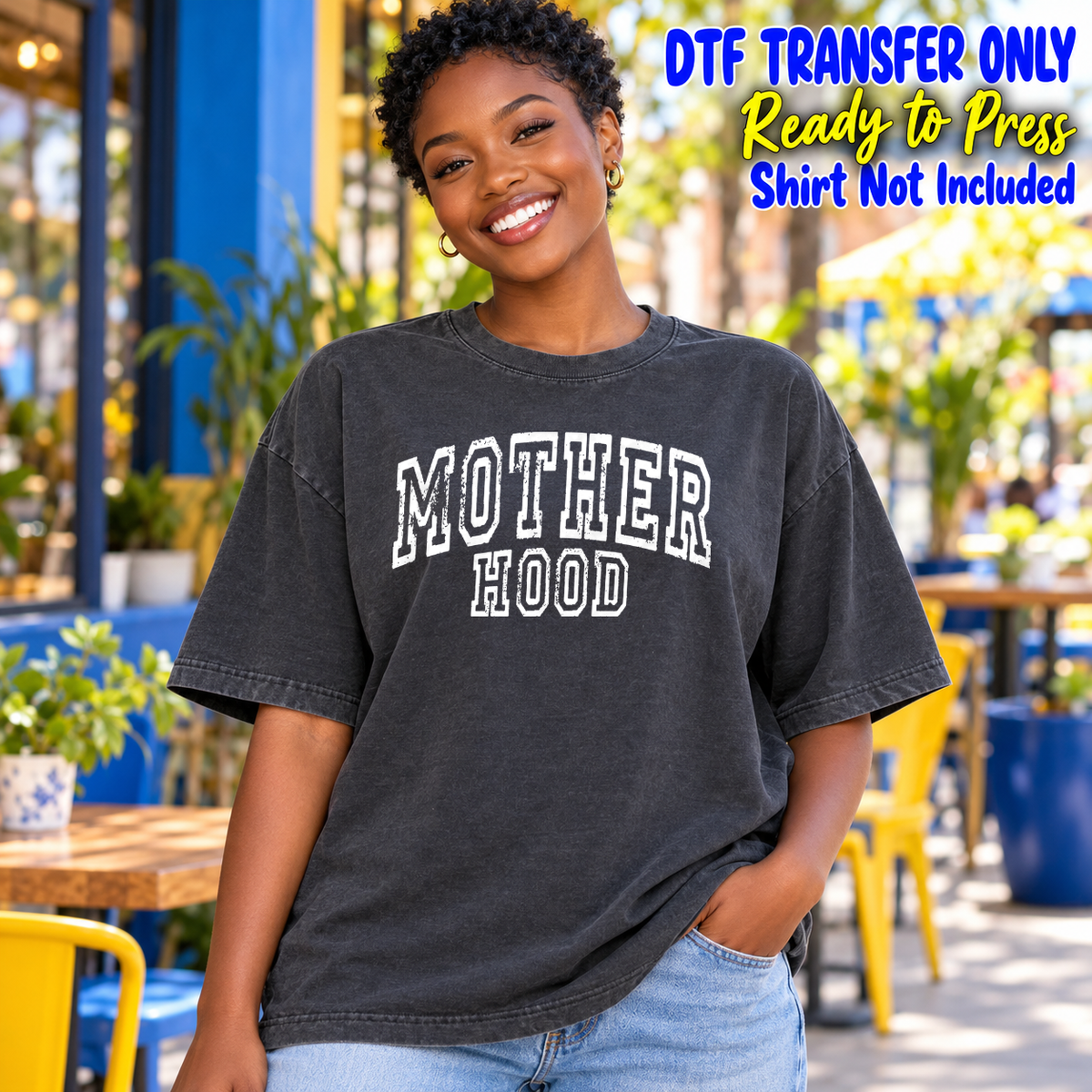 Model wearing a charcoal shirt showing Mother Hood in outlined collegiate lettering; DTF transfer only, shirt not included.