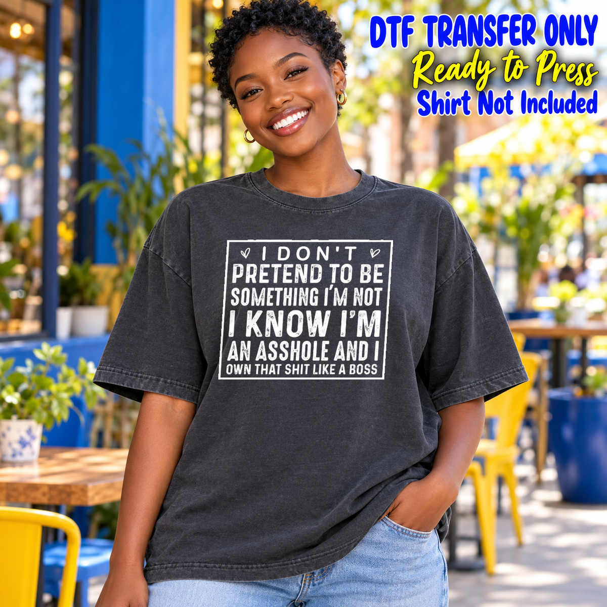 Model wearing a charcoal shirt showing I Don’t Pretend to Be Something I’m Not adult-humor quote in white framed text; DTF transfer only, shirt not included.