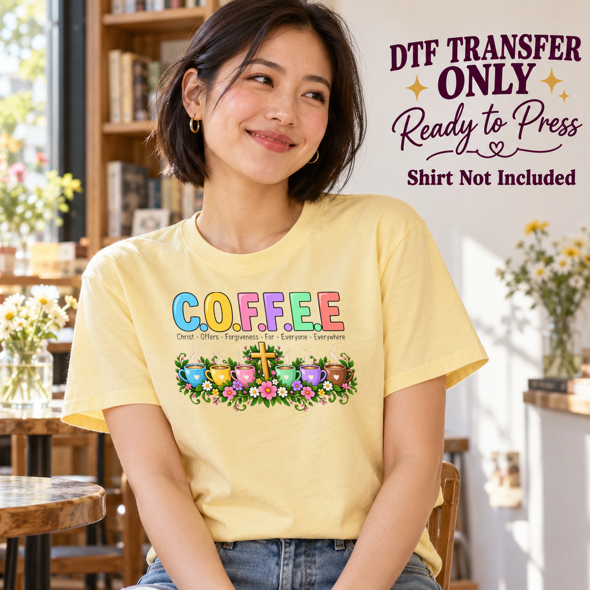 Model wearing a yellow shirt with c.o.f.f.e.e. acronym with colorful mugs flowers and cross; DTF transfer only, shirt not included.