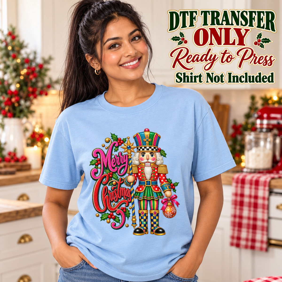 Model wearing a light blue shirt with colorful nutcracker with merry christmas script; DTF transfer only, shirt not included.