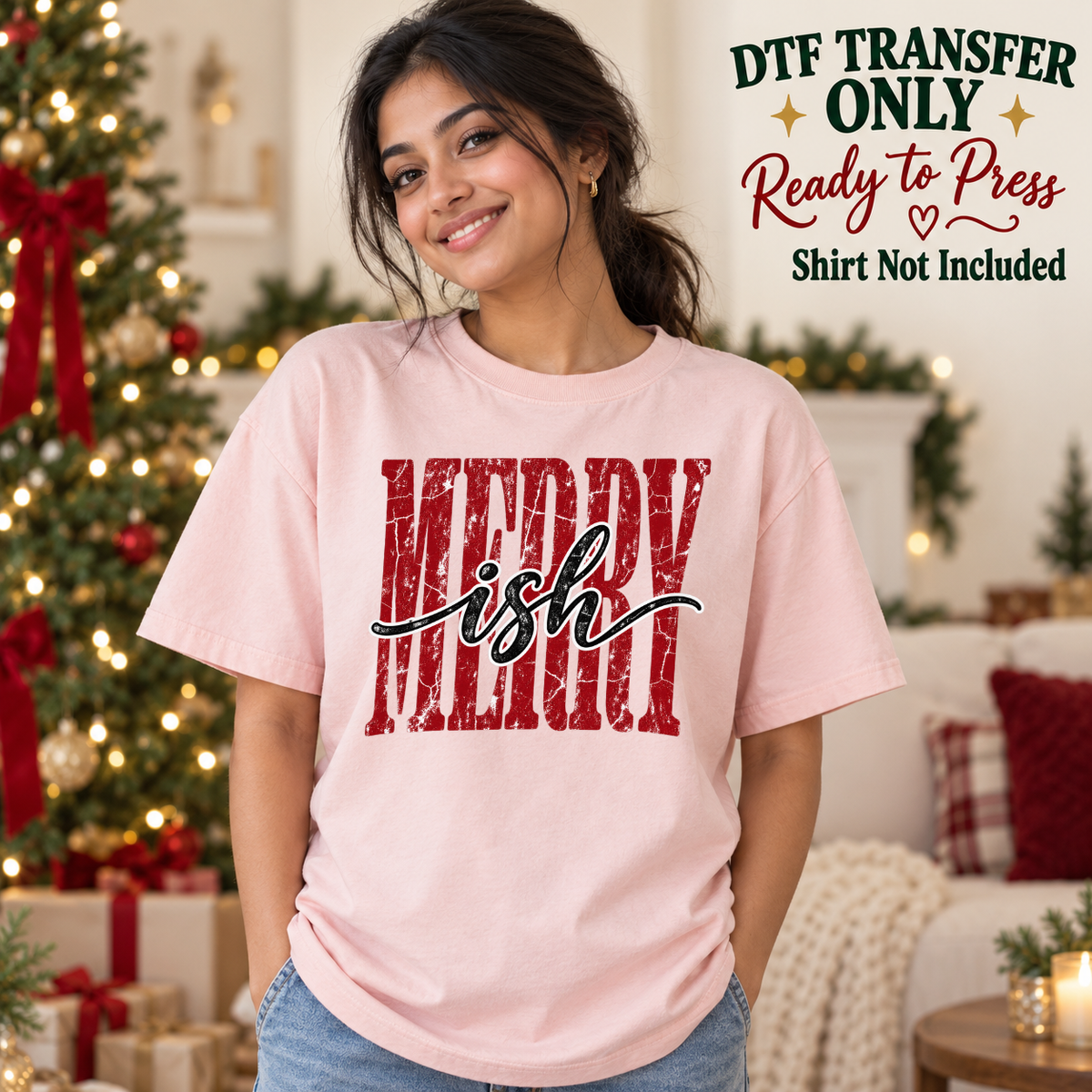 Merry ish red and black lettering shown on a pink shirt worn by a woman; DTF transfer only, shirt not included.