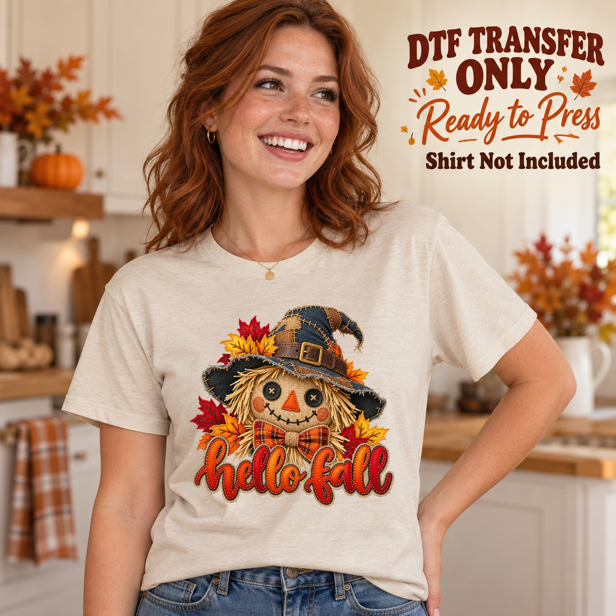 Hello Fall scarecrow with autumn leaves shown on a cream shirt worn by a woman; DTF transfer only, shirt not included.