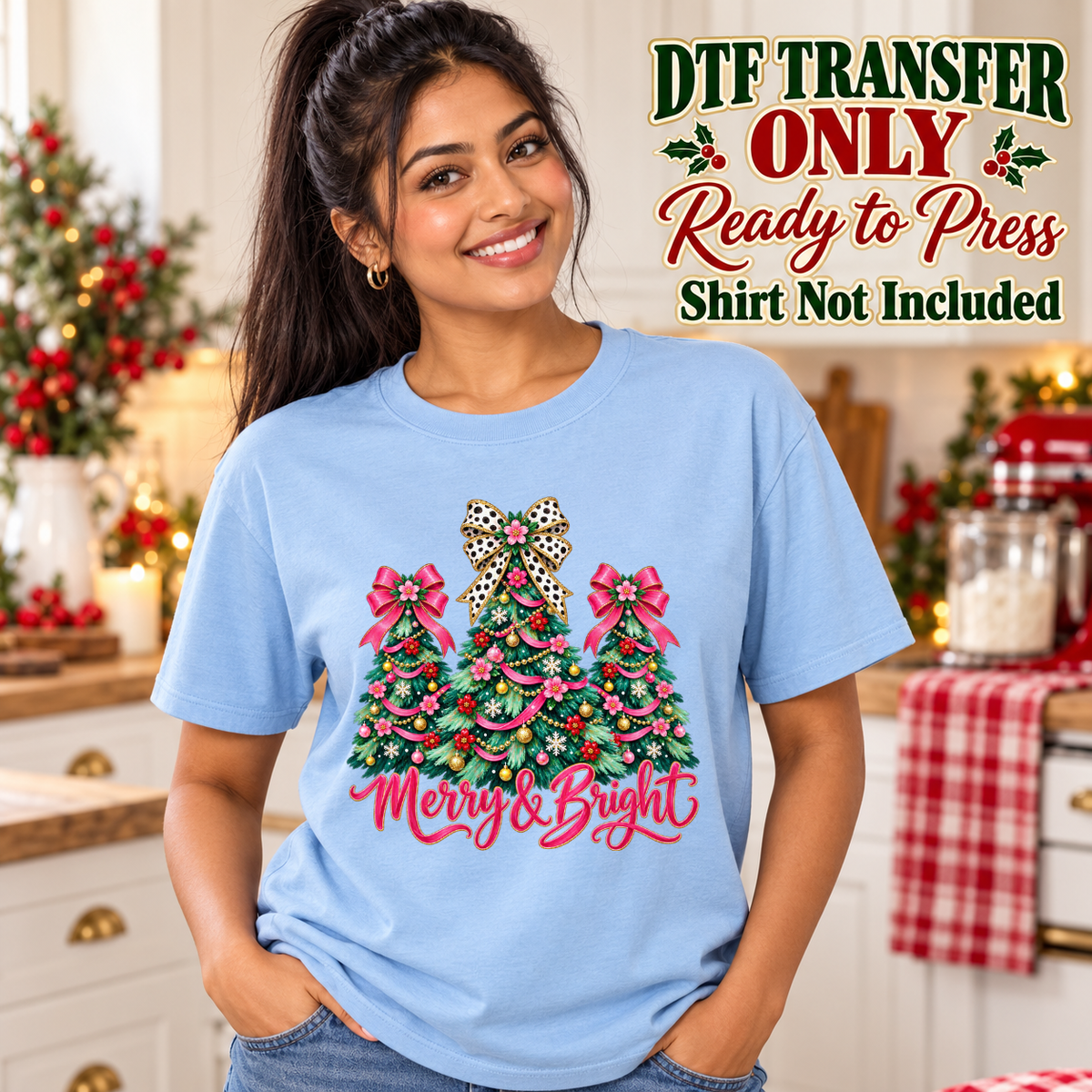 Merry and Bright Christmas trees with pink bows shown on a light blue shirt worn by a woman; DTF transfer only, shirt not included.