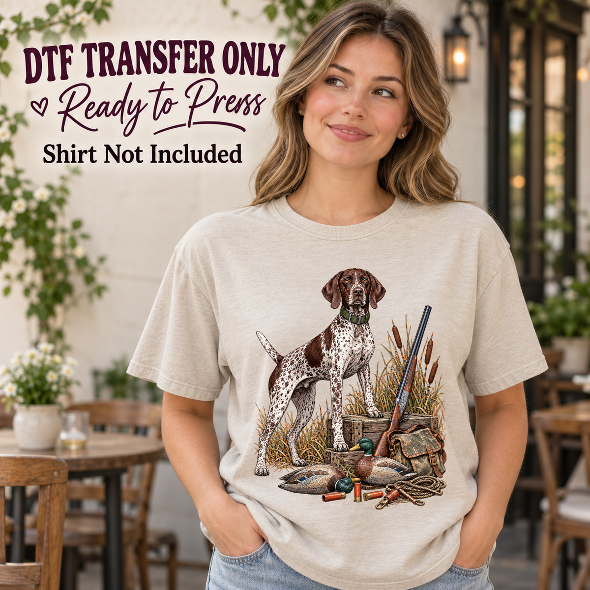 Pointer hunting dog with waterfowl and outdoor gear shown on a cream shirt worn by a woman; DTF transfer only, shirt not included.