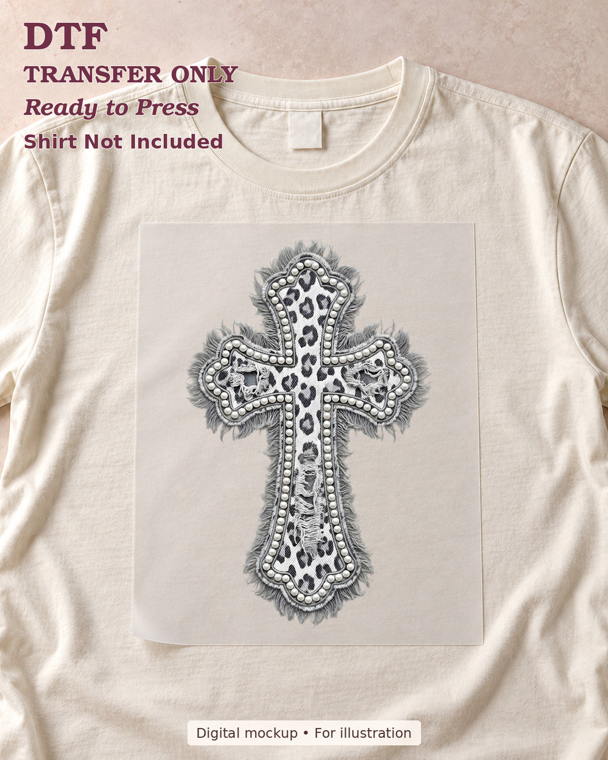 Ornate gray and black leopard-pattern cross with layered decorative edging, shown as a transfer sheet on a cream shirt; shirt not included.