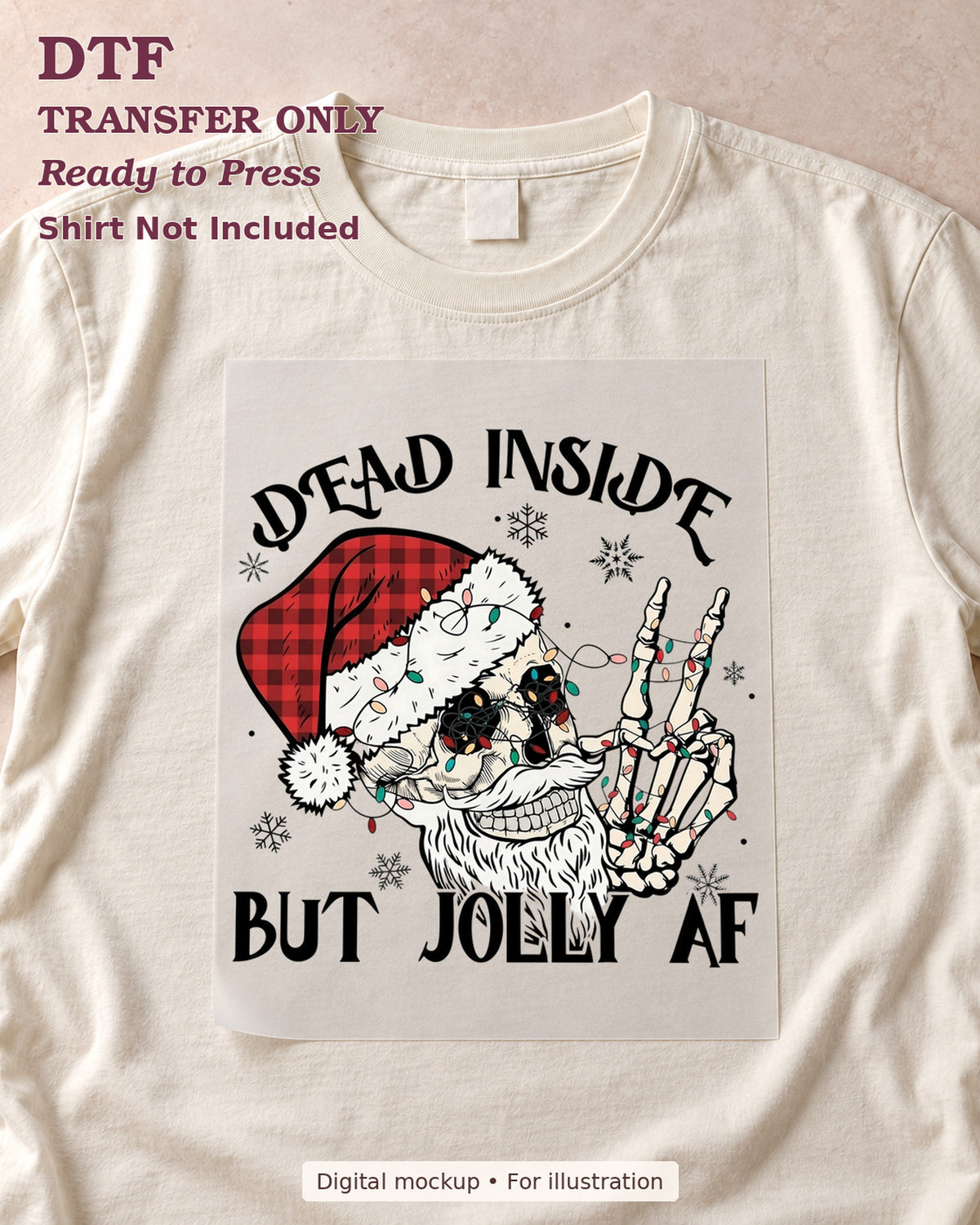 Dead Inside but Jolly AF skull with plaid Santa hat and skeleton peace sign, shown as a transfer sheet on a cream shirt; shirt not included.