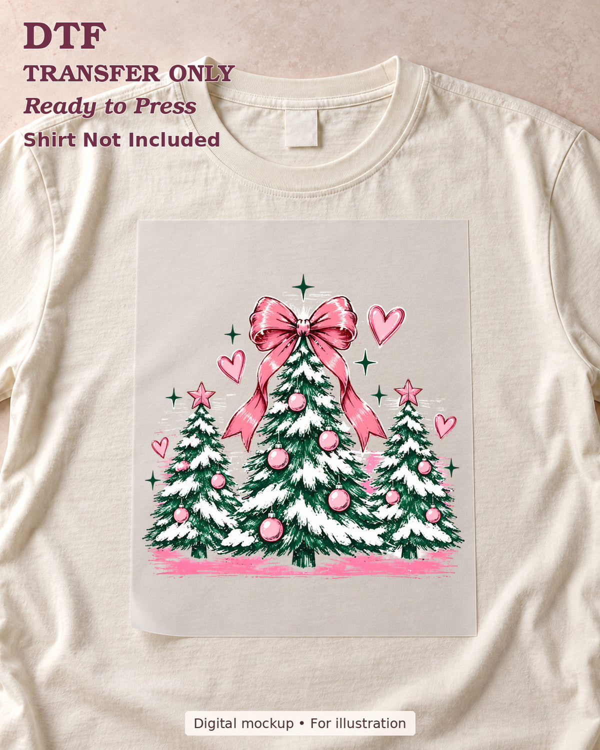 Snowy Christmas trees with pink ornaments hearts and large bow, shown as a transfer sheet on a cream shirt; shirt not included.