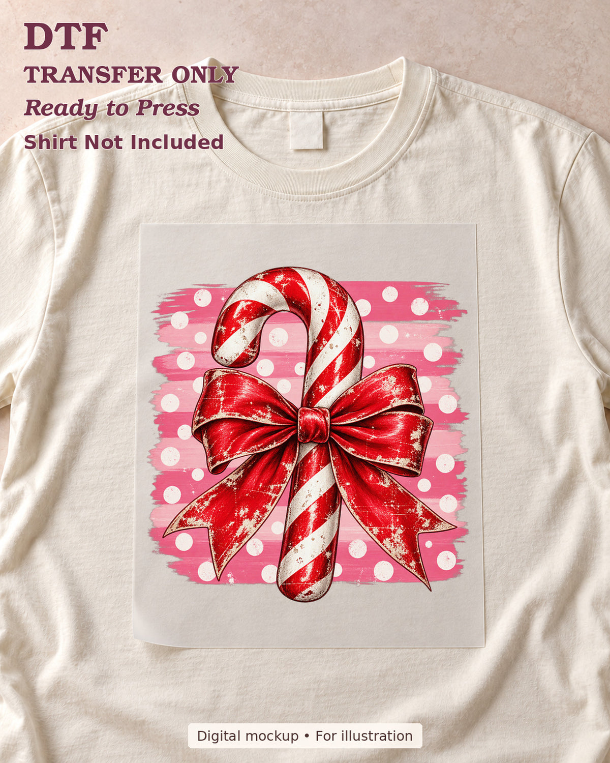 Red-and-white candy cane with a red bow over pink polka-dot brushstrokes shown as a transfer sheet on a cream shirt; shirt not included.