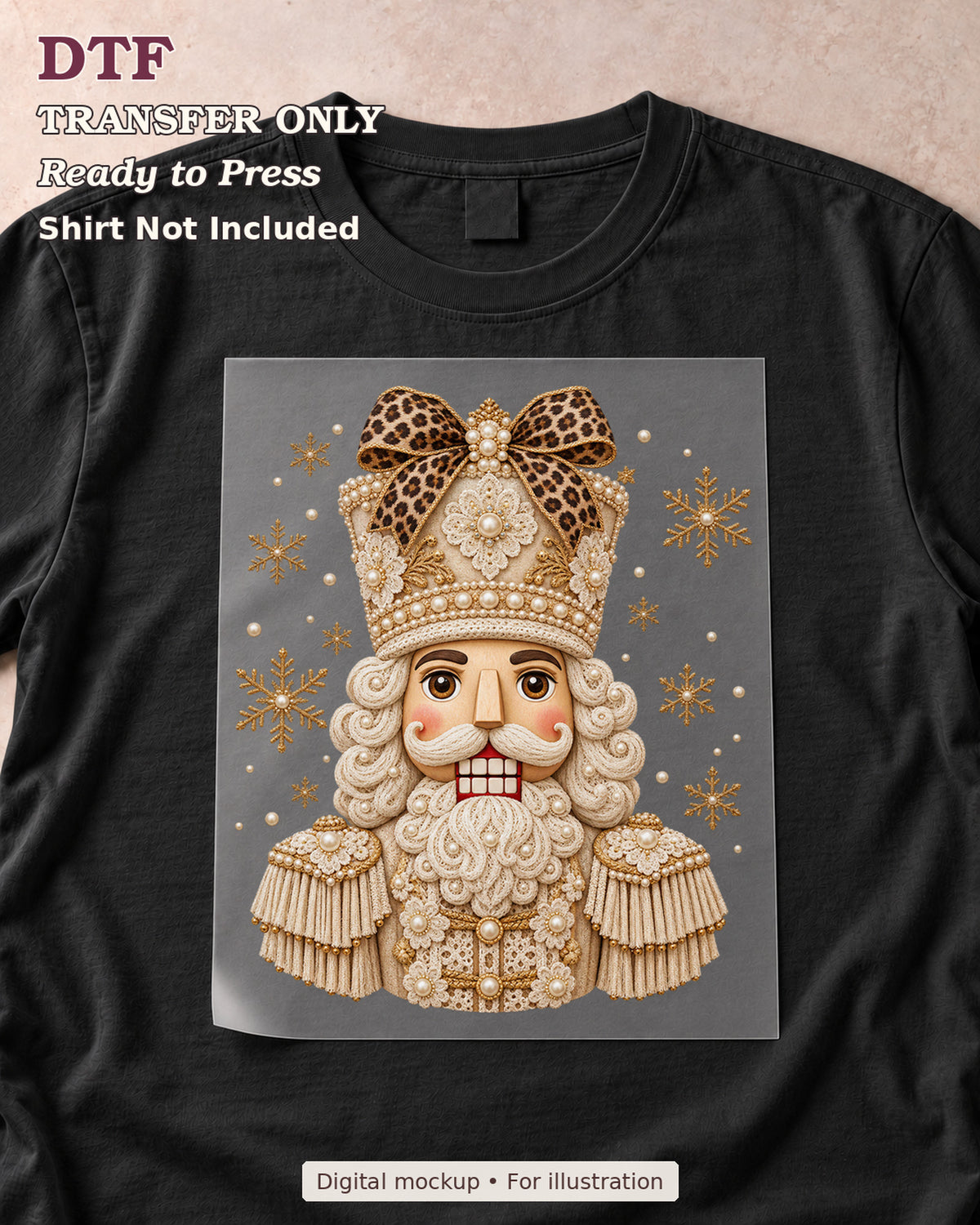 Cream-and-gold ornamental nutcracker with a leopard-print bow and snowflakes shown as a transfer sheet on a black shirt; shirt not included.