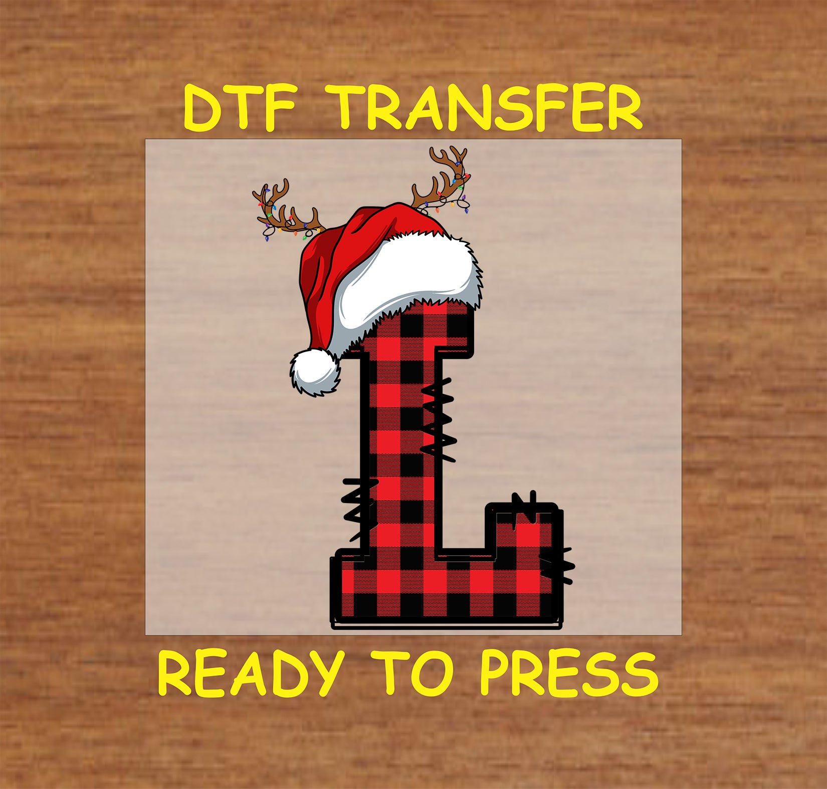 DTF transfer featuring a buffalo plaid letter "L" adorned with a Santa hat and reindeer antlers, perfect for festive holiday apparel and Christmas crafting.
