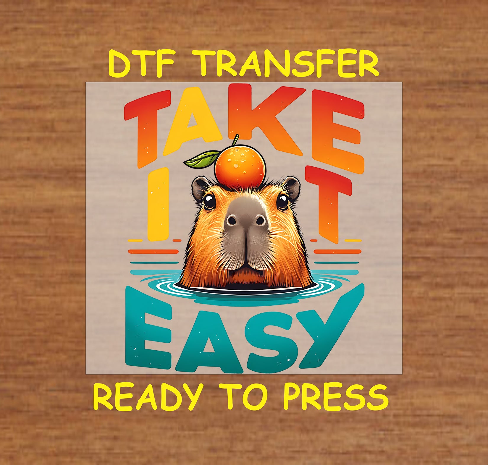 Relaxed capybara DTF transfer design with the text "Take It Easy" and an orange on its head for custom apparel.