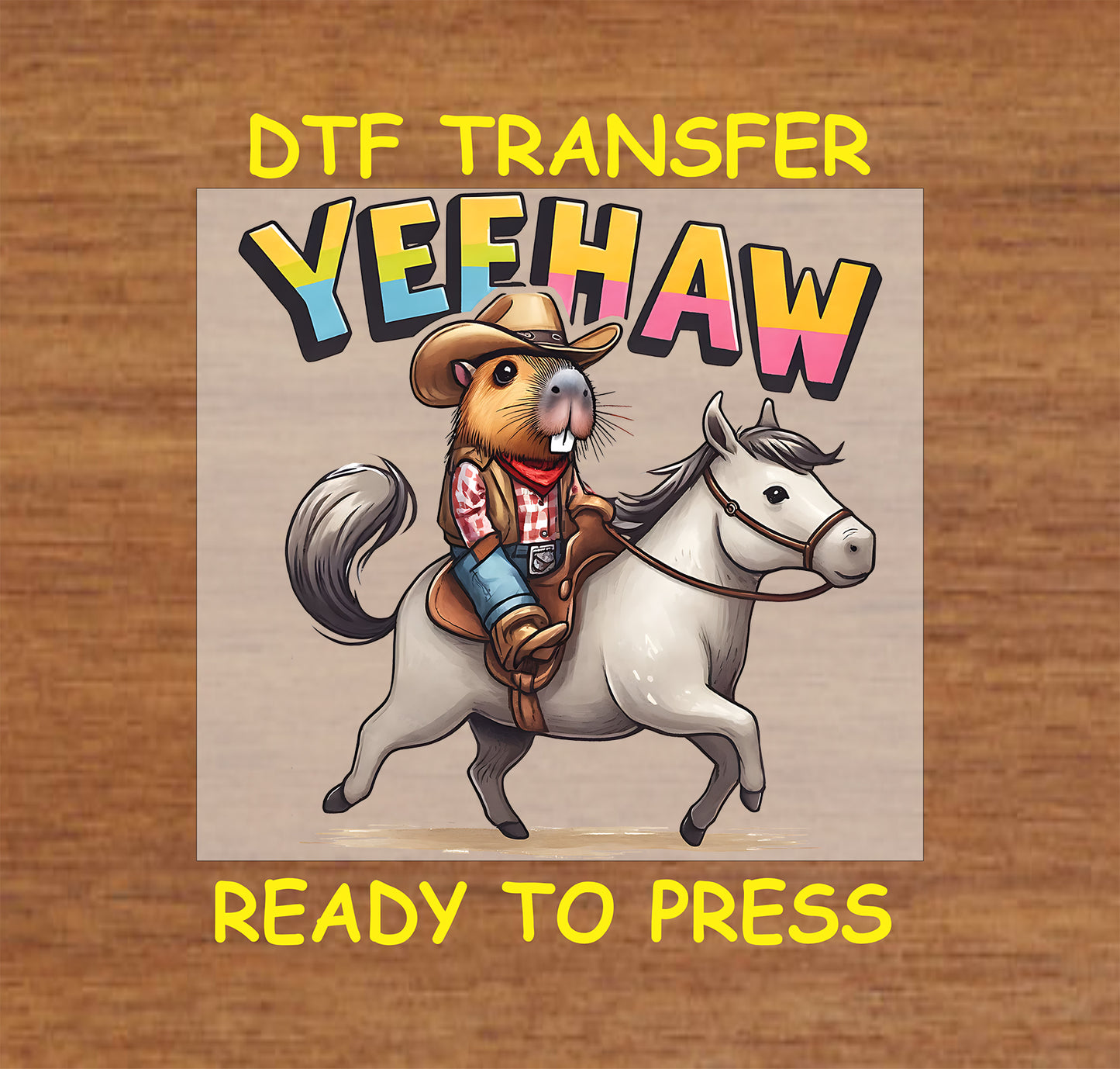 Yeehaw cowboy capybara DTF transfer featuring a capybara in a cowboy outfit riding a white horse with colorful Yeehaw text.