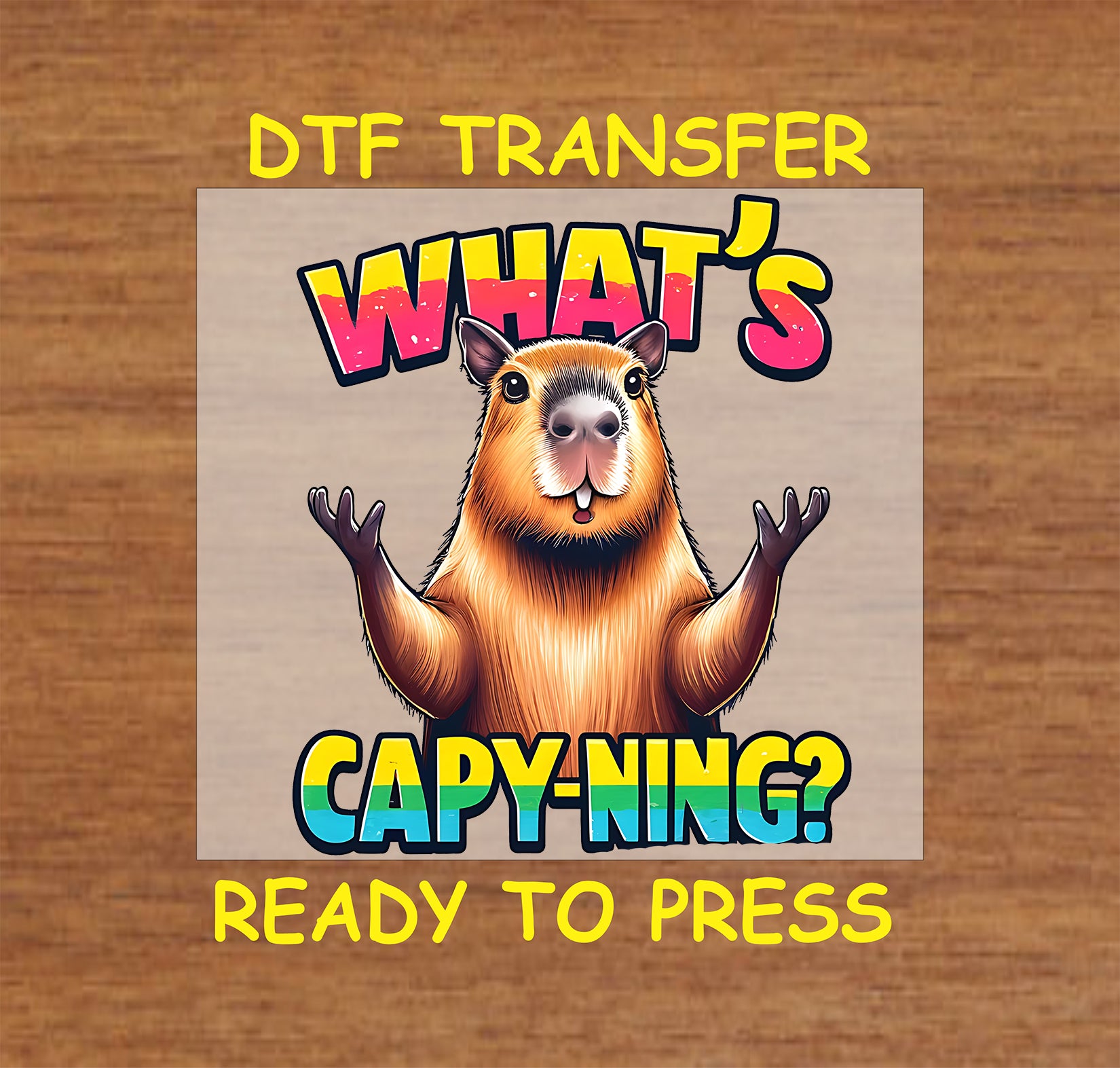 Funny "What's Capy-ning?" DTF transfer featuring a cheerful capybara and vibrant text.