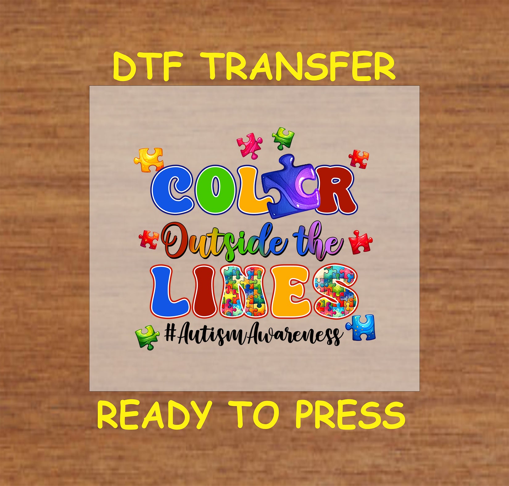 "Color Outside the Lines" Autism Awareness DTF transfer with colorful puzzle pieces and bold, vibrant text design.