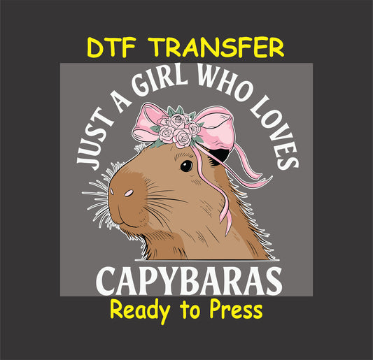 "Charming capybara design with a floral bow and the phrase 'Just a Girl Who Loves Capybaras' for DTF transfers."