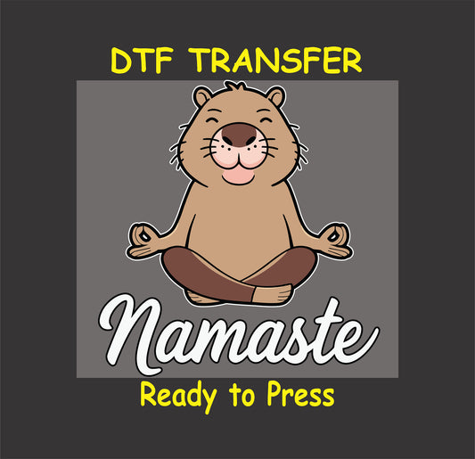 "Capybara in a yoga pose with the text 'Namaste,' a cute DTF transfer design for custom apparel."