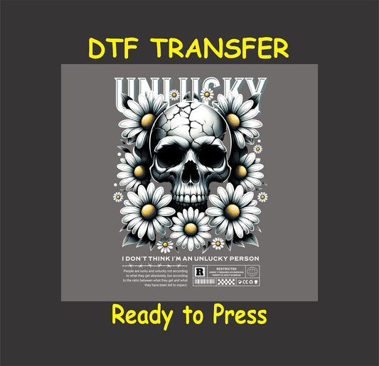 "Unlucky skull and daisy design DTF transfer for gothic and alternative apparel, ready to press."
