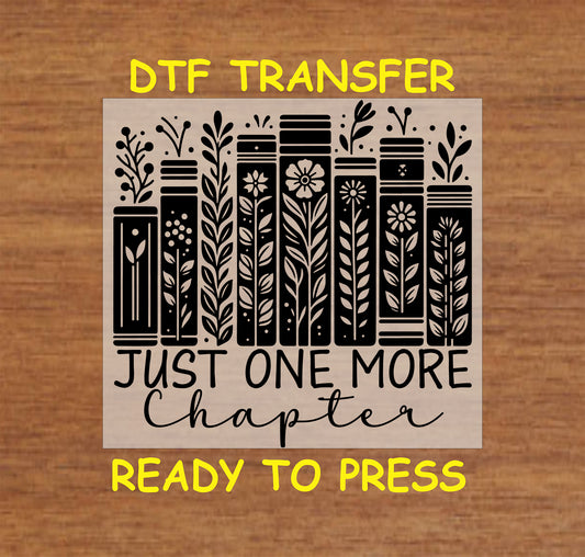 DTF transfer featuring a row of decorative books with floral patterns and the phrase "Just One More Chapter."