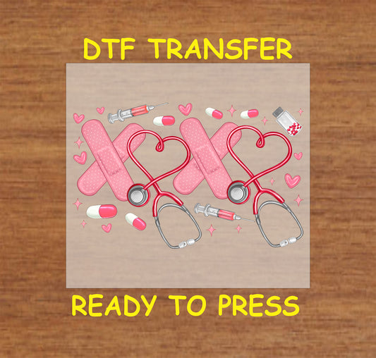 DTF transfer featuring Valentine's "XOXO Nurse" design with stethoscopes forming hearts, band-aids, pills, syringes, and pink accents.

