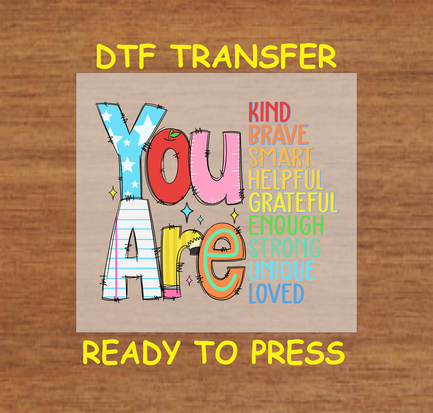 DTF transfer featuring the phrase "You Are" with words like Kind, Brave, Smart, Strong, and Loved in colorful text.