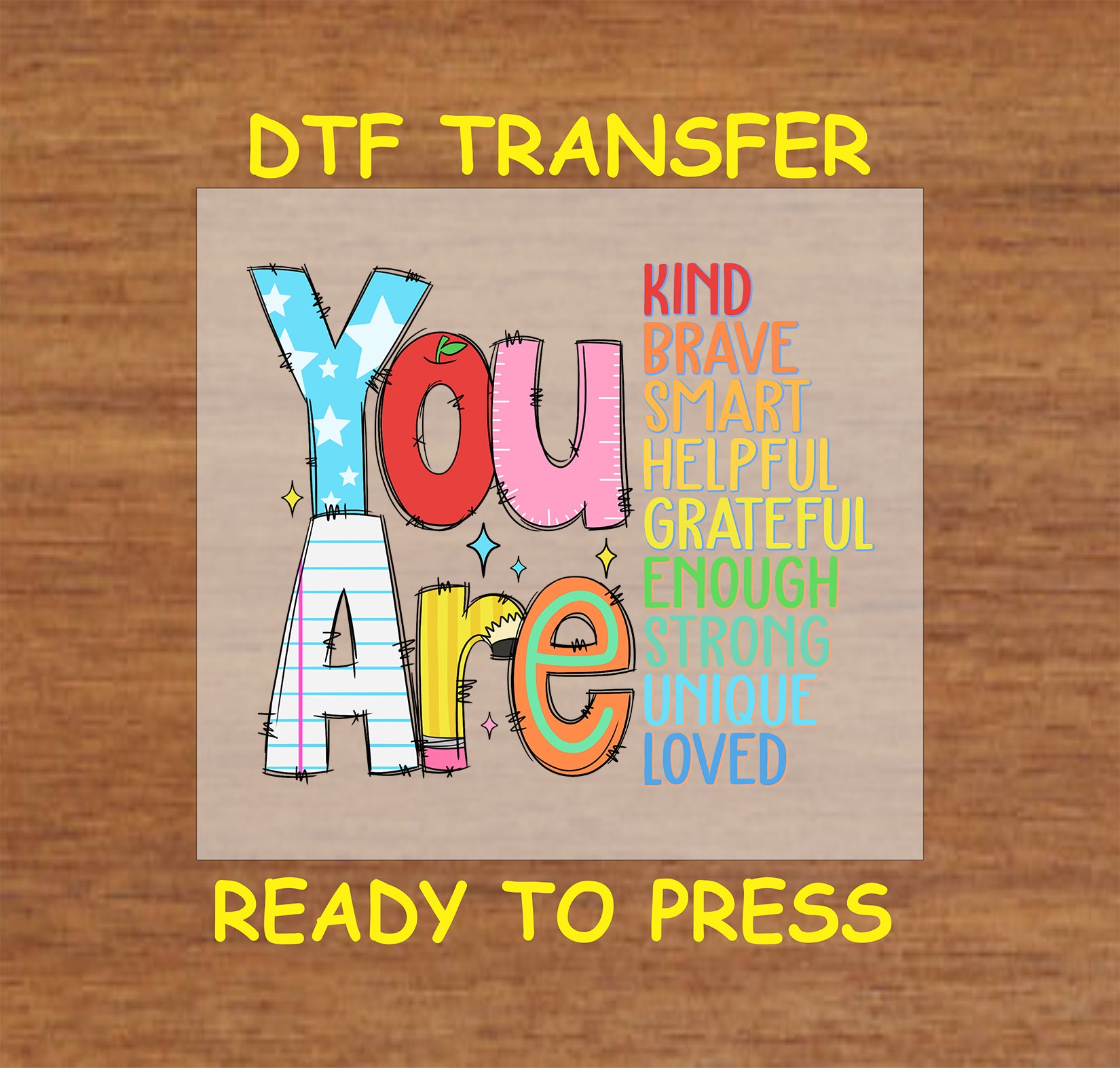 DTF transfer featuring the phrase "You Are" with words like Kind, Brave, Smart, Strong, and Loved in colorful text.