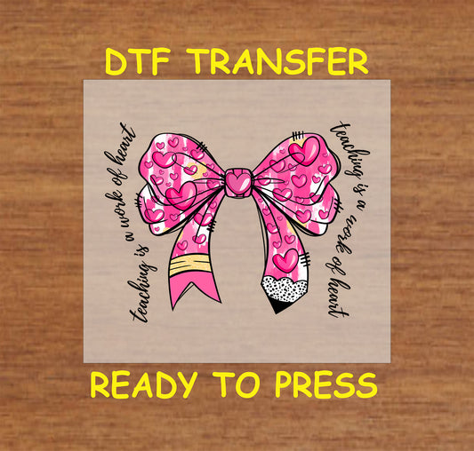 "Teaching is a Work of Heart" DTF transfer featuring a pink bow with heart accents and pencil detail, perfect for teacher gifts and crafts.