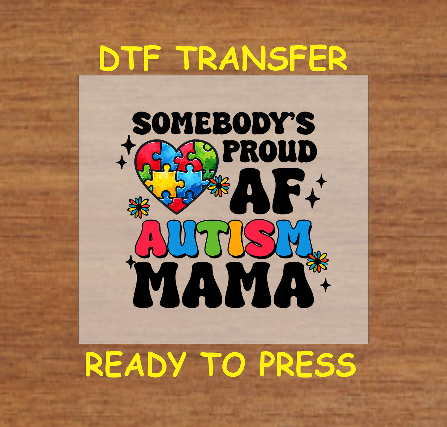 "Somebody's Proud AF Autism Mama" DTF transfer with heart-shaped puzzle pieces, colorful accents, and bold text.