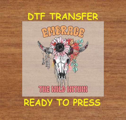 "DTF transfer featuring a boho skull with a floral crown and the phrase 'Embrace the Wild Within' in bold lettering."