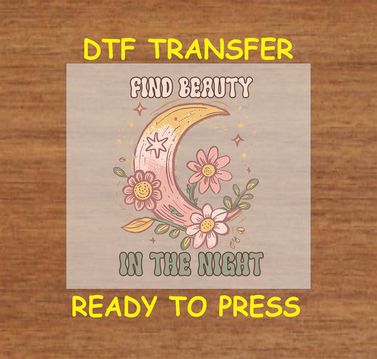 "DTF transfer featuring a crescent moon with flowers and the phrase 'Find Beauty in the Night' in retro-style lettering."