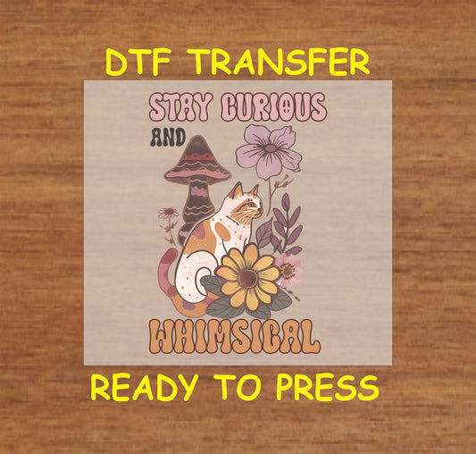 "Stay Curious and Whimsical DTF transfer with cat, mushrooms, and floral accents, ready to press."