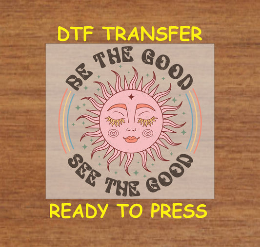 "Be the Good See the Good DTF transfer with a whimsical sun and positive text, ready to press."